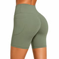 Pantaloncini leggings da donna M in tessuto elasticizzato verde oliva a vita alta con tasca laterale per sport